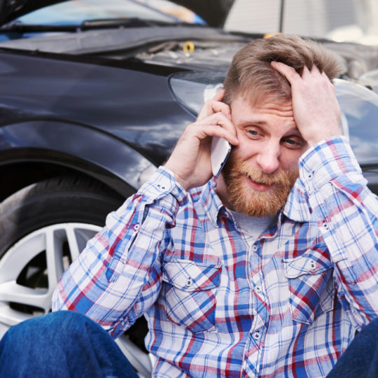 man-having-a-problem-with-his-car